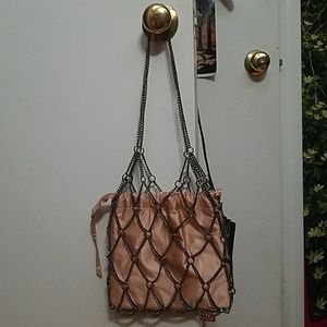 Pink bag with chain detailing